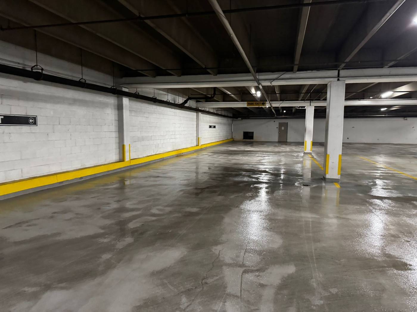 Pressure-washed parking garage floor