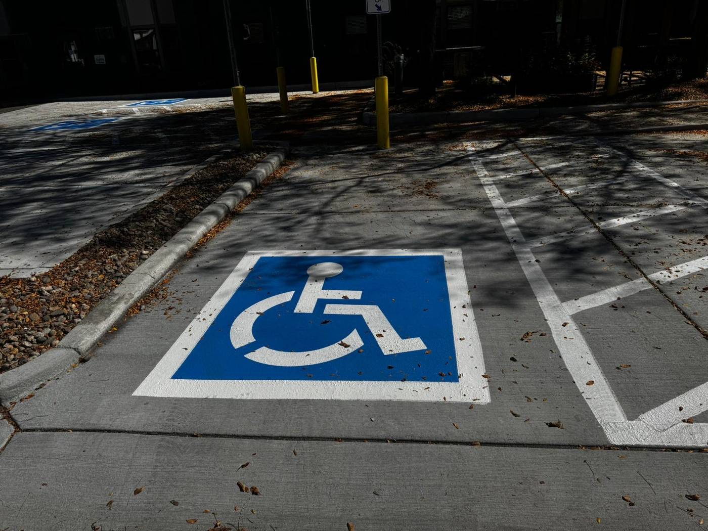 Thermoplastic accessible symbol and parking lines