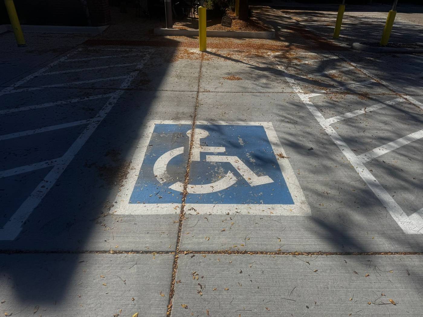 Accessible pavement symbol before restoration