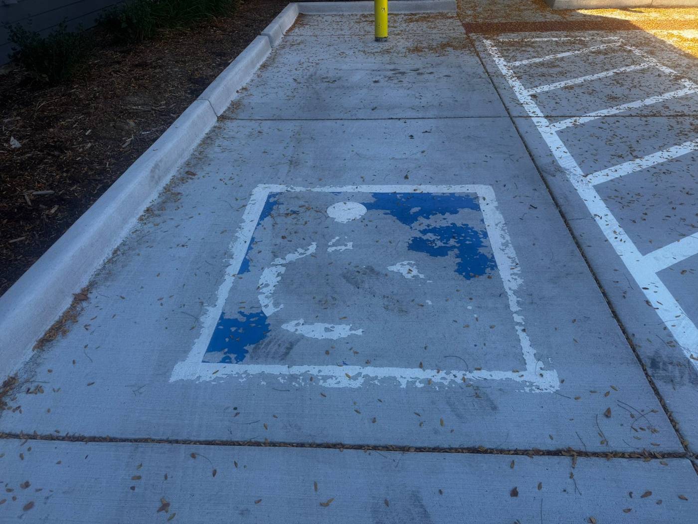 Accessible parking marking before replacement